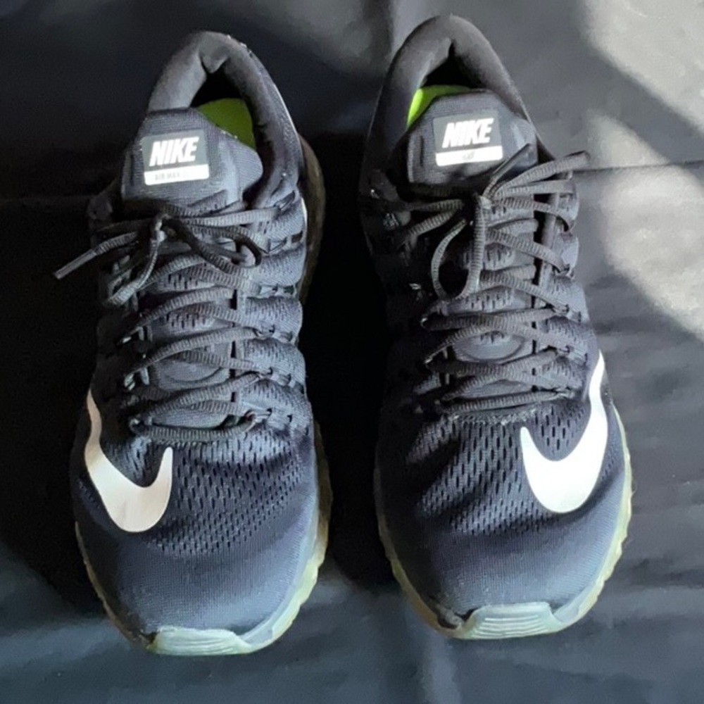 Nike Black Athletic Shoes with Mesh Upper and Cushioned Soles